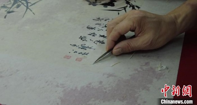 讓殘破古畫“起死回生”的“書畫醫生”